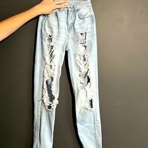 blue jeans,high rise,rips all the way down